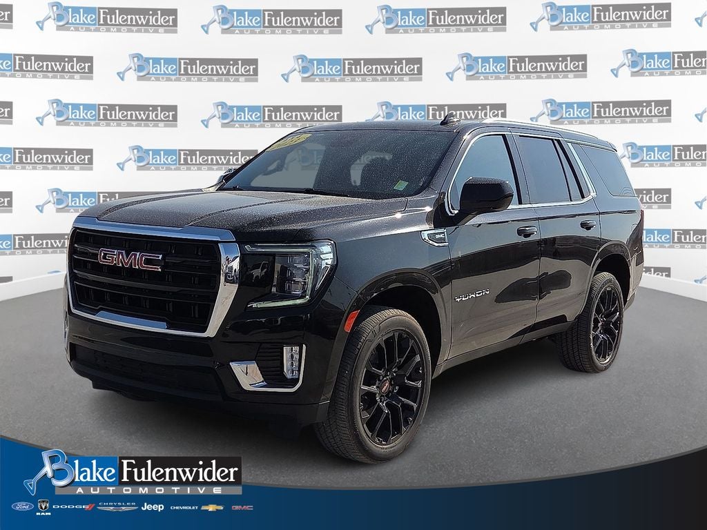 2023 GMC Yukon SLE in Onyx Black — front three-quarter view