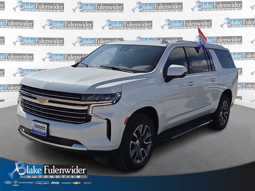 2023 Chevrolet Suburban LT in Iridescent Pearl Tricoat — front three-quarter view
