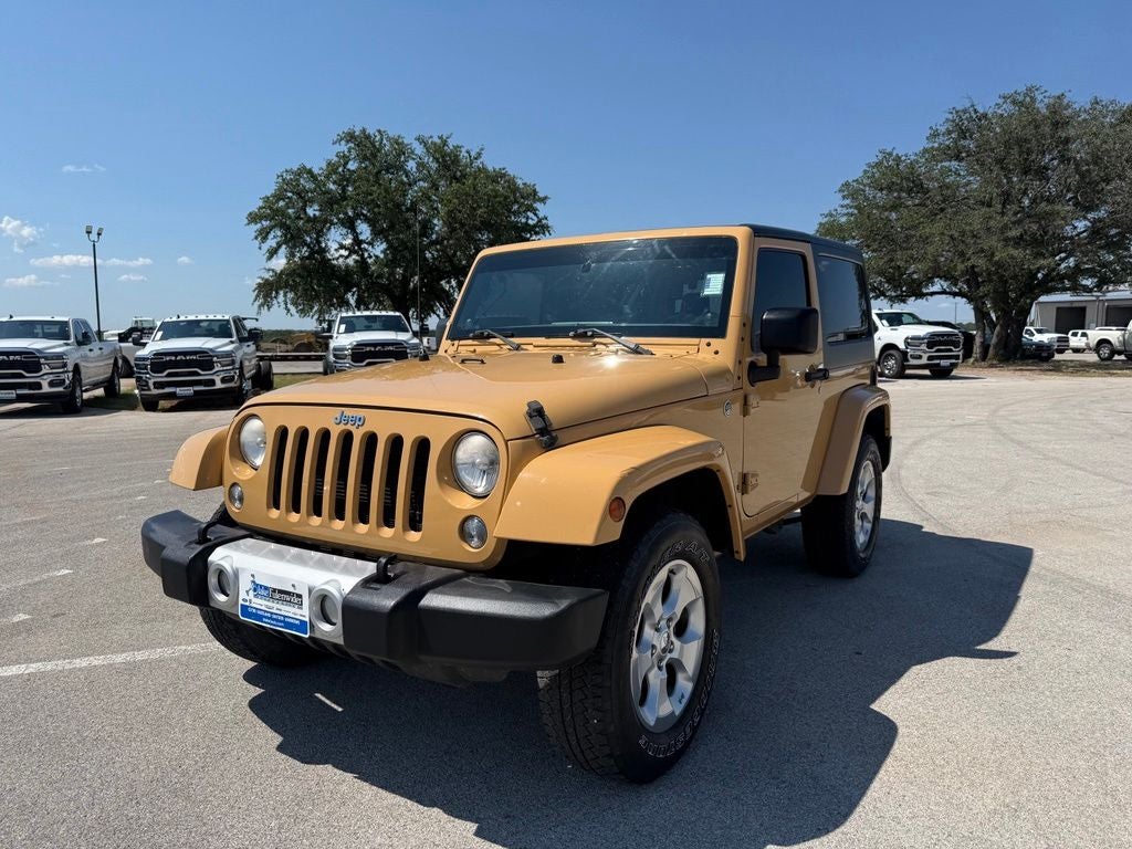 2014 Jeep Wrangler Sahara in Dune Clear Coat — front three-quarter view