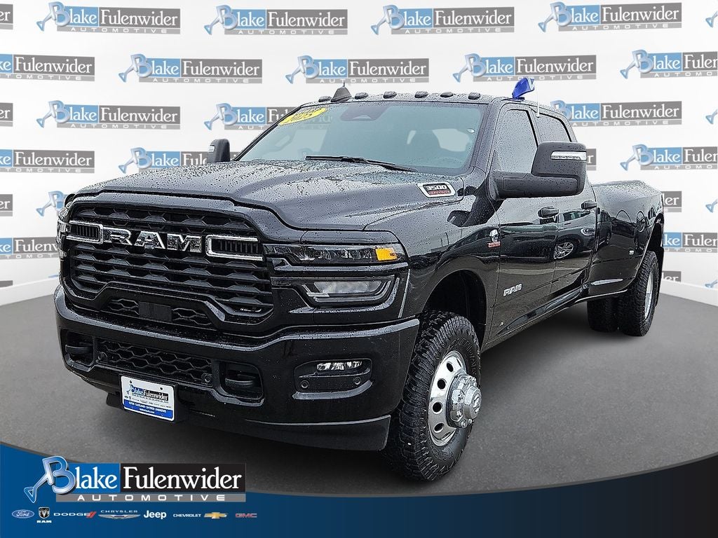 2025 RAM 3500 Big Horn Crew Cab 4x4 8' Box in Diamond Black Crystal Pearlcoat — front three-quarter view